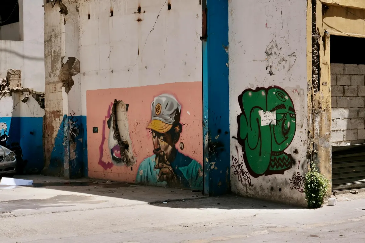 A vibrant street art mural on an urban wall